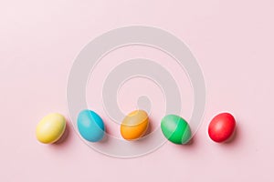 holiday preparation Multi colors Easter eggs on colored background . Pastel color Easter eggs. holiday concept with copy