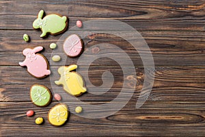 holiday preparation Multi colors Easter eggs with cookies on colored background . Pastel color Easter eggs. holiday