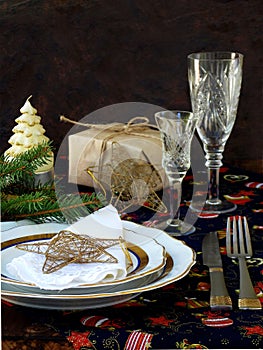 Holiday rustic Christmas and New Year table setting with xmas decorations at dark wooden table. copy space.