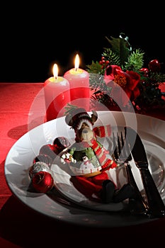 Holiday rustic Christmas and New Year table setting with xmas decorations at dark wooden table. Selective focus