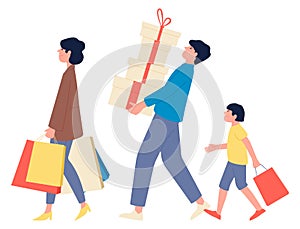 Holiday sale shopping. Parents and son carrying bags and gift boxes