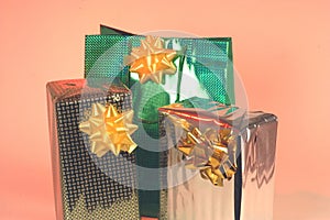 Holiday shopping bags and gift boxes on white background