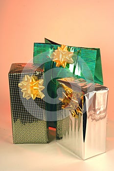 Holiday shopping bags and gift boxes on white background