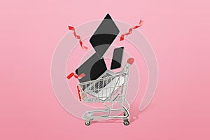 Holiday shopping concept with tech products and cart. Concept of seasonal shopping and discounts