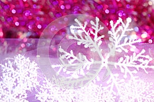 Holiday snowflake on violet background