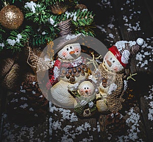 Holiday Snowmen Under Christmas Tree