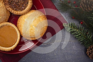 Holiday Table Set with Various Flavors of Fresh Baked Pies