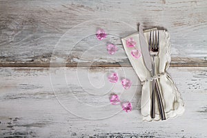 Holiday Table Setting on gray background with hearts