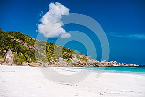 Holiday vacation on Petite Anse sandy tropical paradise beach on La Digue island, Seychelles. Travel exclusive concept