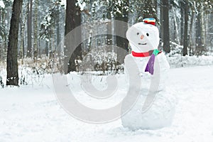 Holiday winter three snowball snowman with hat and scarf