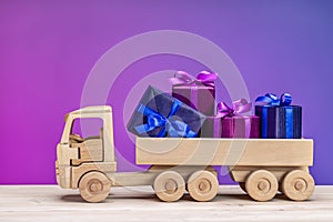 Holiday wrapped boxes in toy truck.