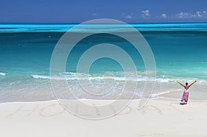 Holiday writing on the desert beach