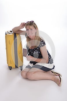 Holidaymaker with passport and luggage