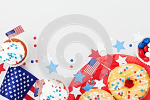 Holidays 4th july background with american flag decorated of sweet foods, stars and confetti. Happy Independence Day table.