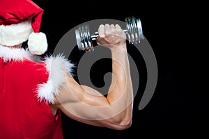 Holidays and celebrations, New year, Christmas, sports, bodybuilding, healthy lifestyle - Muscular handsome Santa Claus