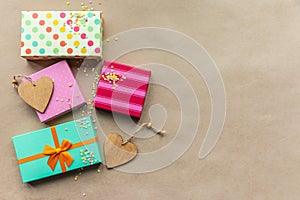Holidays giftboxes on the craft paper background