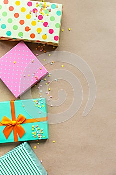 Holidays giftboxes on the craft paper background