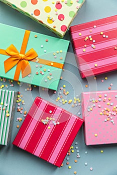 Holidays giftboxes on the pastel mint background