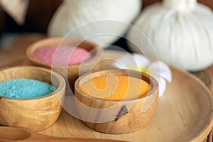 Holistic Spa Relaxation with Three Aromatherapy multicolor salt spa in wooden bowl and Herbal Compress