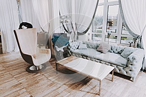 Holl with Blue Sofa and Big Window in Beauty Salon