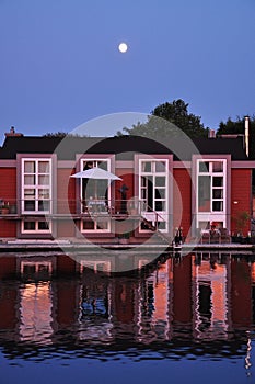 Holland: floating Dutch houseboat and moonshine. photo