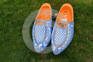 Holland Michigan Clog Shoes Painted in Orange, White and Blue pattern