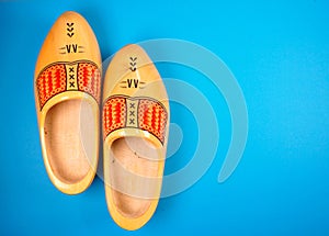 Holland, Netherlands, Amsterdam,volendam, marken, clogs typical Dutch on blue background with copy space for your own text