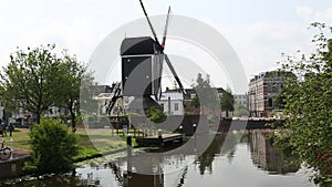 Holland Windmill Tilt Up From Reflection in Canal