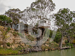 Holliday homes on the banks of the Murray River near Morgan in South Australia photo