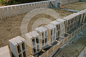Hollow heavy concrete blocks for construction of stone walls building