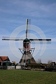 hollow post mill named Heerlijkheid at the water Kromme Does i photo