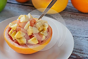 Hollowed out grapefruit with bananas