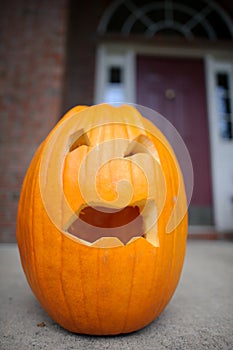 Holloween pumpkin on porch.