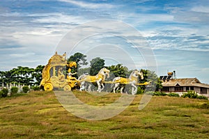 Holly Arjuna chariot of Mahabharata in golden color with amazing sky background