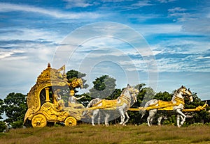 Holly Arjuna chariot of Mahabharata in golden color with amazing sky background