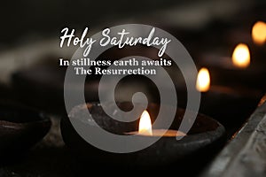 Holly week concept with candle light and inspirational quote - Holy Saturday. In stillness earth awaits The Resurrection.