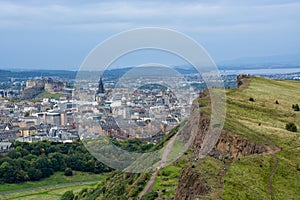 Hollyrood park and Arthur`s Seat with a view on Edinburgh, Scotl