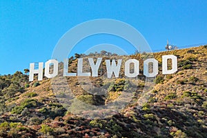 HOLLYWOOD sign on blue sky background. World famous landmark. USA. Los Angeles, California.