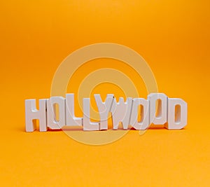 Hollywood wooden words in a orange background