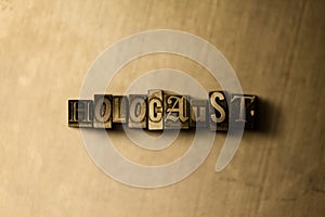 HOLOCAUST - close-up of grungy vintage typeset word on metal backdrop
