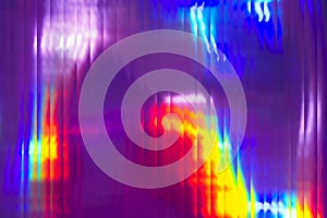 Holographic abstract background. Rainbow neon glass texture pattern. Trendy colorful reeded refract effect