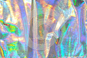 Holographic metallic background.metallic fabric texture with iridescent gradients. wallpaper In silver, purple and green