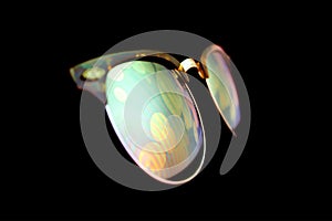Holographic screen reflection on sunglasses in the night photo