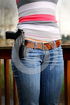 Holstered Sidearm on Ladies Belt