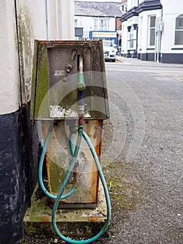 HOLSWORTHY, DEVON, UK - JULY 16 2020: An old diesel pump distributor rusting.