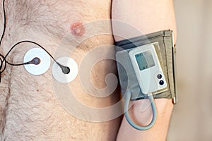 Holter monitor device and daily blood pressure recorder on human