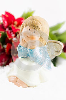 Holy baby Angel with poinsettia