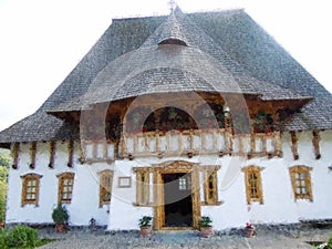 The Holy Barsana Monastery, made of stone and wood, Maramures County. Brush cough, photo painting