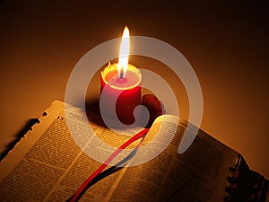 Holy Bible and Candle photo