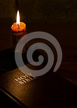 The Holy Bible by candlelight photo